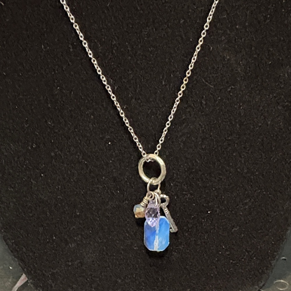 Elegant Silver Necklace with Blue and Purple Charms